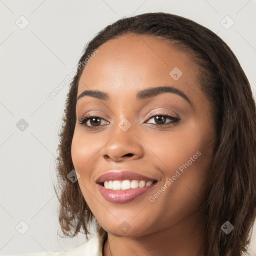 Joyful white young-adult female with long  brown hair and brown eyes