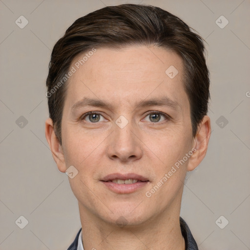 Joyful white adult male with short  brown hair and grey eyes