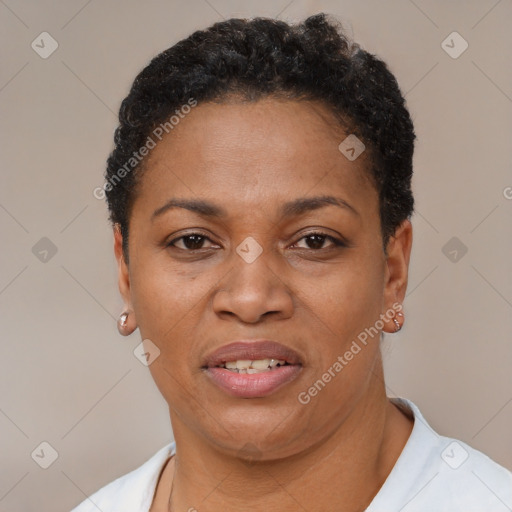 Joyful latino adult female with short  brown hair and brown eyes