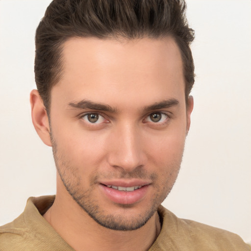 Joyful white young-adult male with short  brown hair and brown eyes