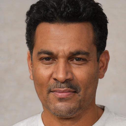 Neutral latino adult male with short  black hair and brown eyes