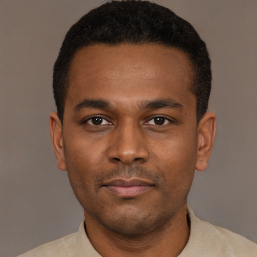 Neutral black young-adult male with short  black hair and brown eyes