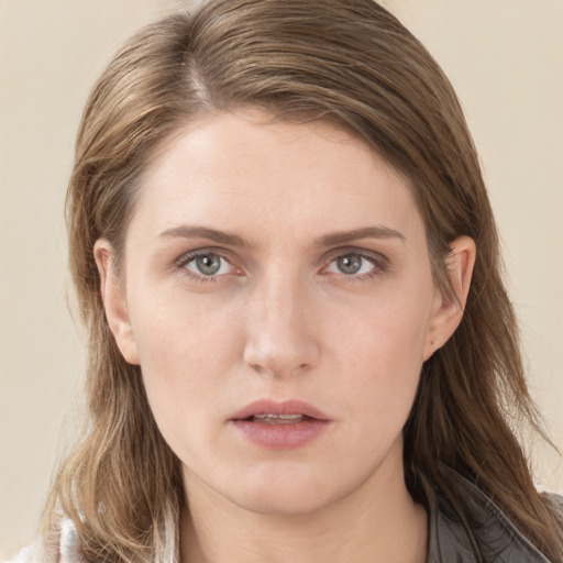 Neutral white young-adult female with long  brown hair and brown eyes