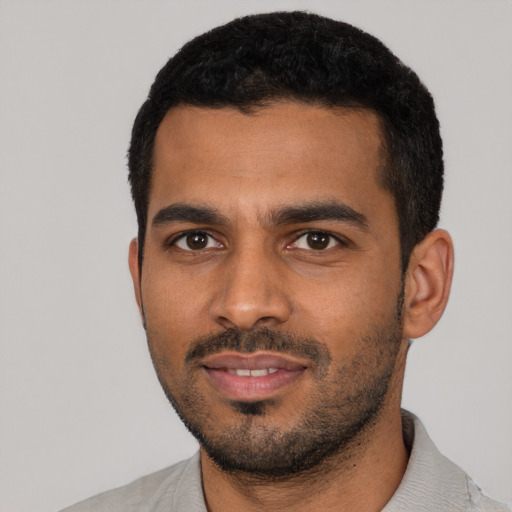 Neutral black young-adult male with short  black hair and brown eyes