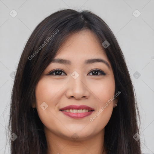 Joyful asian young-adult female with long  brown hair and brown eyes