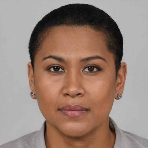 Neutral latino young-adult female with short  brown hair and brown eyes