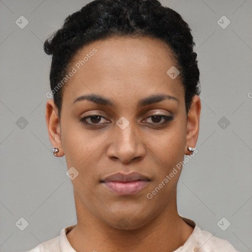 Joyful black young-adult female with short  black hair and brown eyes