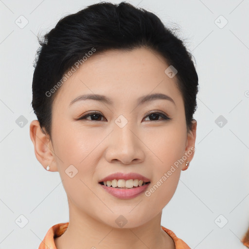 Joyful asian young-adult female with short  brown hair and brown eyes