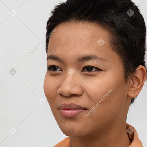 Joyful asian young-adult female with short  brown hair and brown eyes