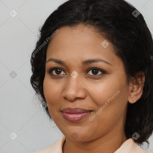 Joyful black young-adult female with medium  brown hair and brown eyes