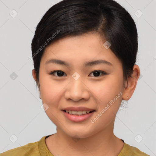 Joyful asian young-adult female with short  brown hair and brown eyes