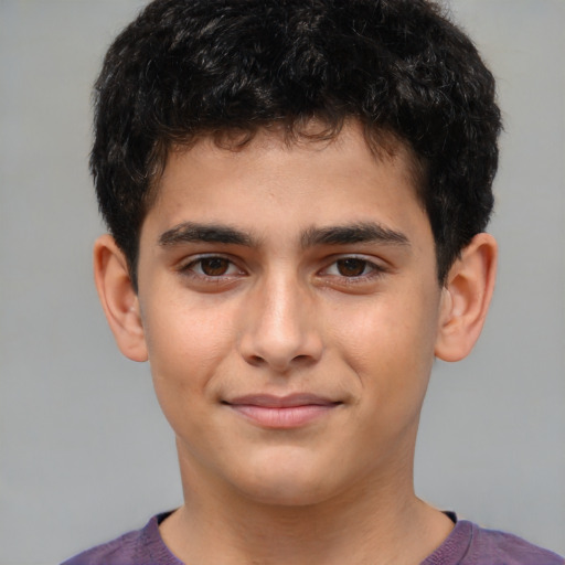 Joyful white child male with short  brown hair and brown eyes