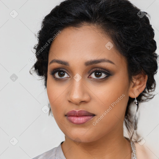 Joyful latino young-adult female with long  brown hair and brown eyes