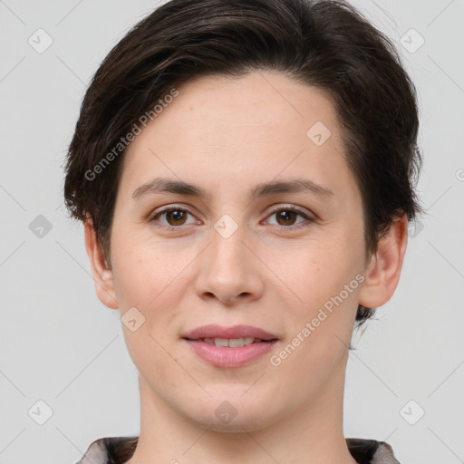 Joyful white young-adult female with short  brown hair and brown eyes