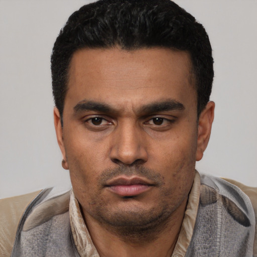 Neutral latino young-adult male with short  black hair and brown eyes