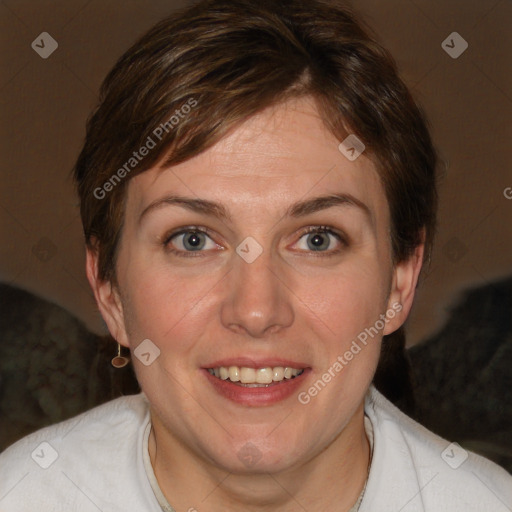 Joyful white adult female with medium  brown hair and blue eyes