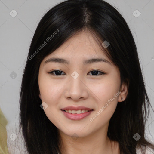 Joyful asian young-adult female with long  brown hair and brown eyes