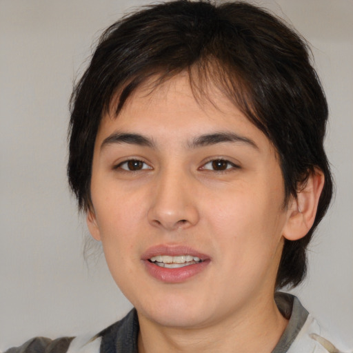 Joyful white young-adult female with medium  brown hair and brown eyes