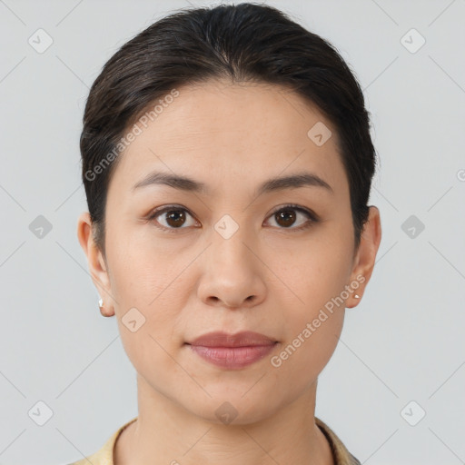 Joyful asian young-adult female with short  brown hair and brown eyes