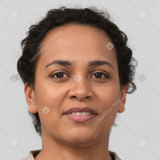 Joyful latino young-adult female with short  brown hair and brown eyes