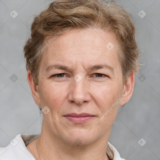 Joyful white adult male with short  brown hair and grey eyes