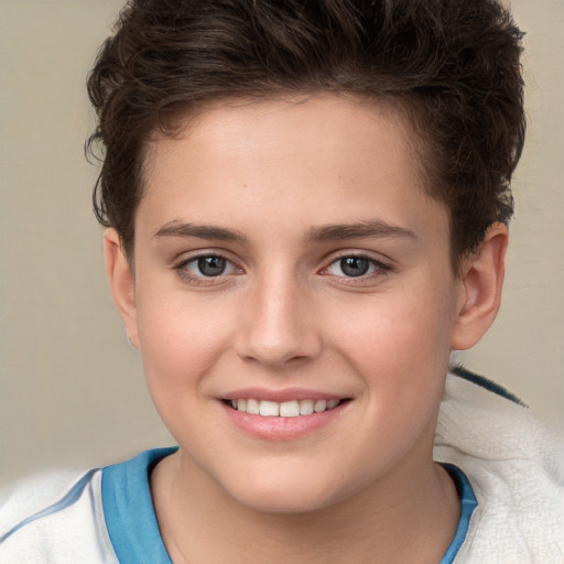 Joyful white child female with short  brown hair and brown eyes