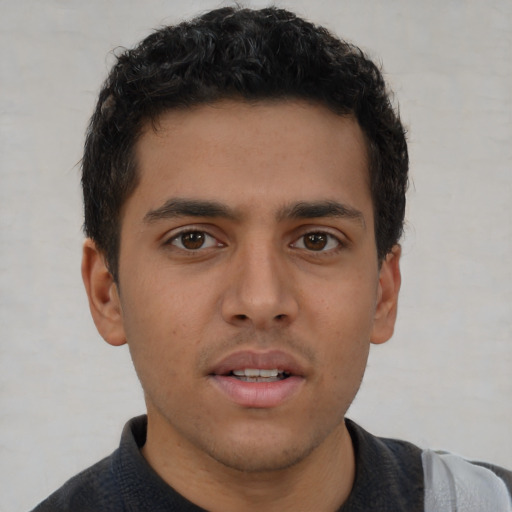 Neutral latino young-adult male with short  brown hair and brown eyes