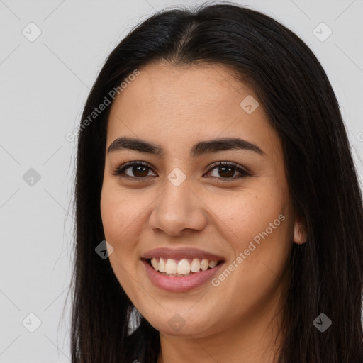 Joyful asian young-adult female with long  brown hair and brown eyes