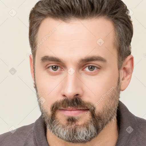 Neutral white adult male with short  brown hair and brown eyes