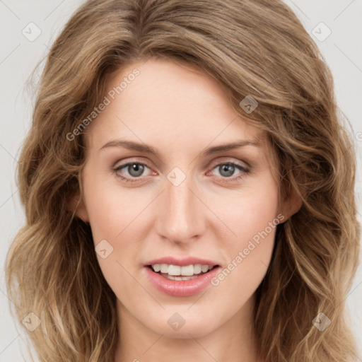 Joyful white young-adult female with long  brown hair and green eyes