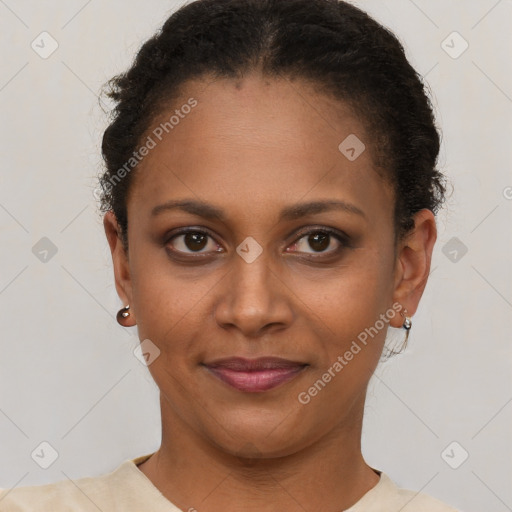 Joyful latino young-adult female with short  brown hair and brown eyes