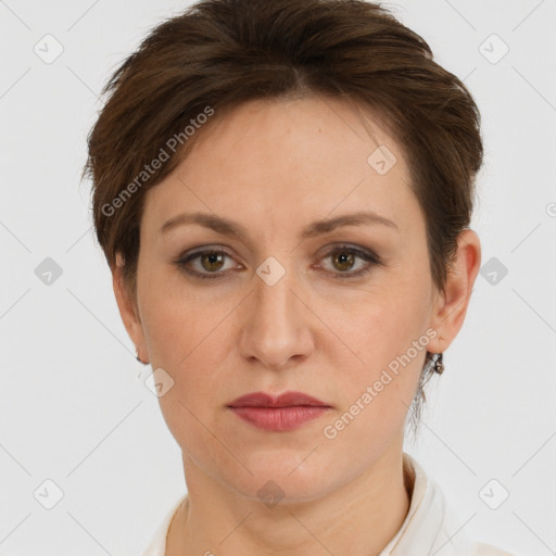 Joyful white adult female with short  brown hair and brown eyes