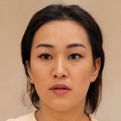 Neutral asian young-adult female with medium  brown hair and brown eyes