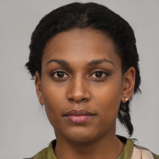 Neutral black young-adult female with short  black hair and brown eyes