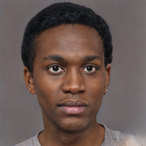 Neutral black young-adult male with short  brown hair and brown eyes