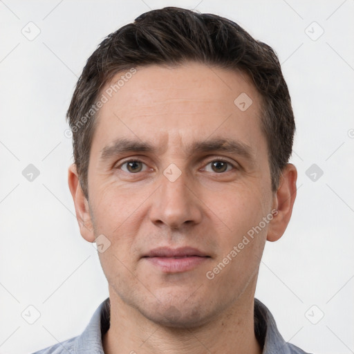 Neutral white adult male with short  brown hair and brown eyes