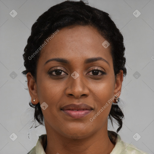 Joyful black young-adult female with medium  black hair and brown eyes