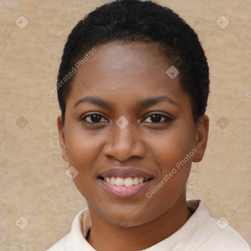 Joyful black young-adult female with short  brown hair and brown eyes