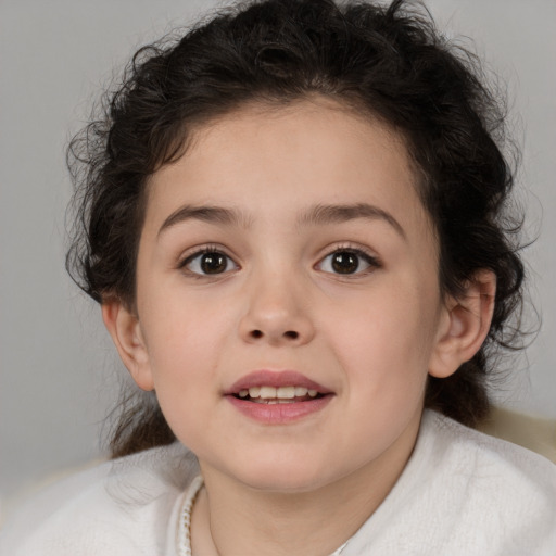 Joyful white child female with medium  brown hair and brown eyes