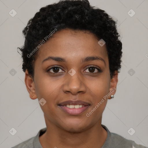 Joyful black young-adult female with short  black hair and brown eyes