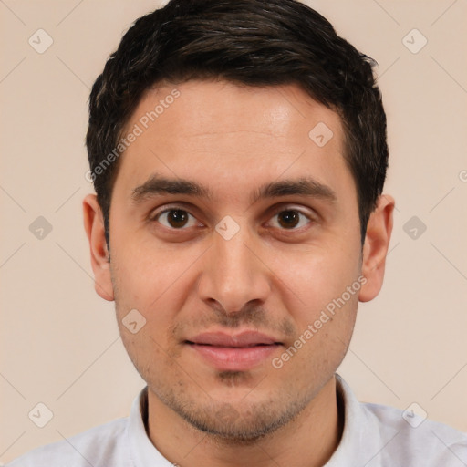 Joyful white young-adult male with short  brown hair and brown eyes