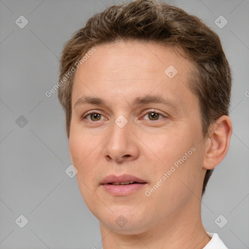 Joyful white adult female with short  brown hair and brown eyes