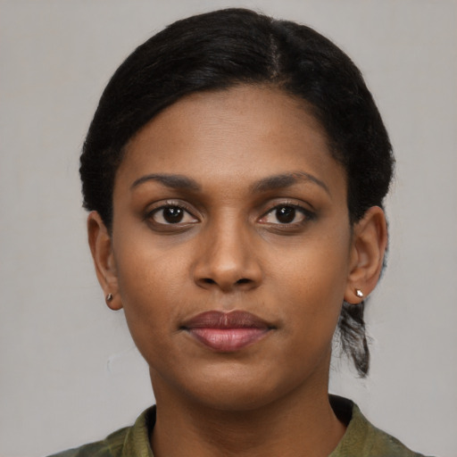 Neutral black young-adult female with medium  black hair and brown eyes