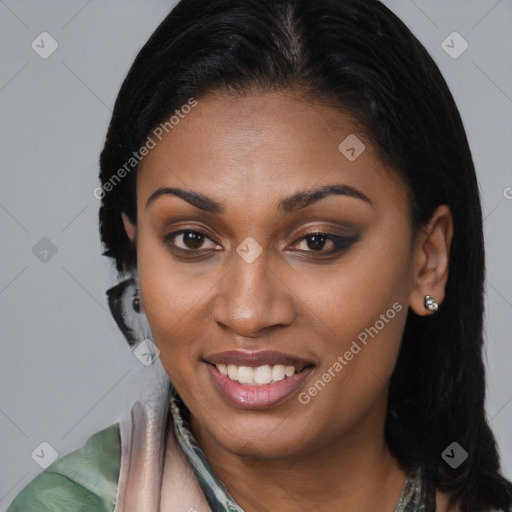 Joyful latino young-adult female with long  brown hair and brown eyes