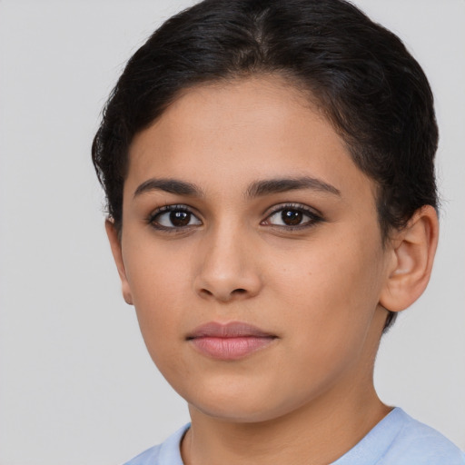 Neutral latino young-adult female with short  brown hair and brown eyes