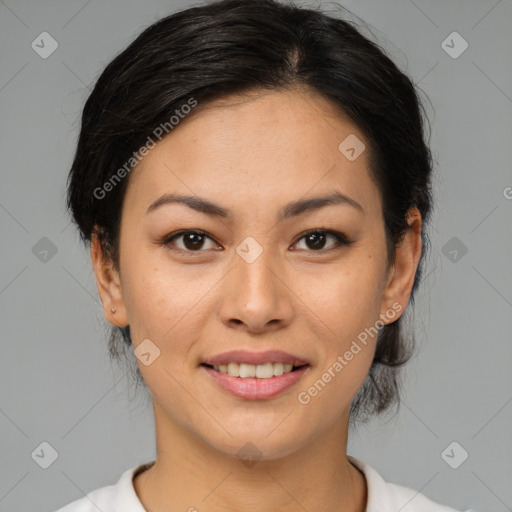 Joyful asian young-adult female with medium  brown hair and brown eyes