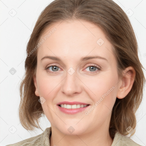 Joyful white young-adult female with medium  brown hair and blue eyes