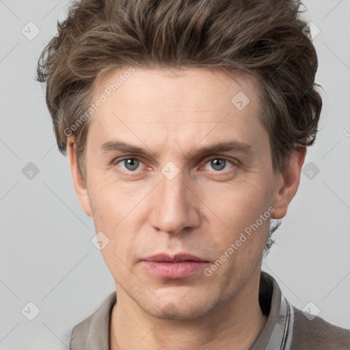 Neutral white adult male with short  brown hair and grey eyes