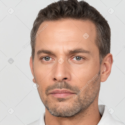 Neutral white adult male with short  brown hair and brown eyes