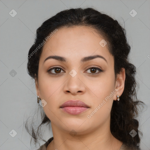 Joyful latino young-adult female with long  brown hair and brown eyes